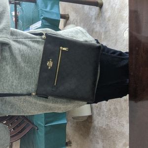 Monogrammed Coach cross body bag